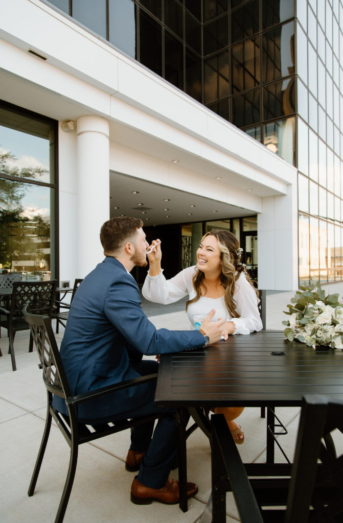 Bride and Groom's Portraits in Downtown Tyler, Texas for Intimate Wedding Day captured by Lizzie Hillard Photography. Ice cream at Andy's on the Tyler, Texas Square.