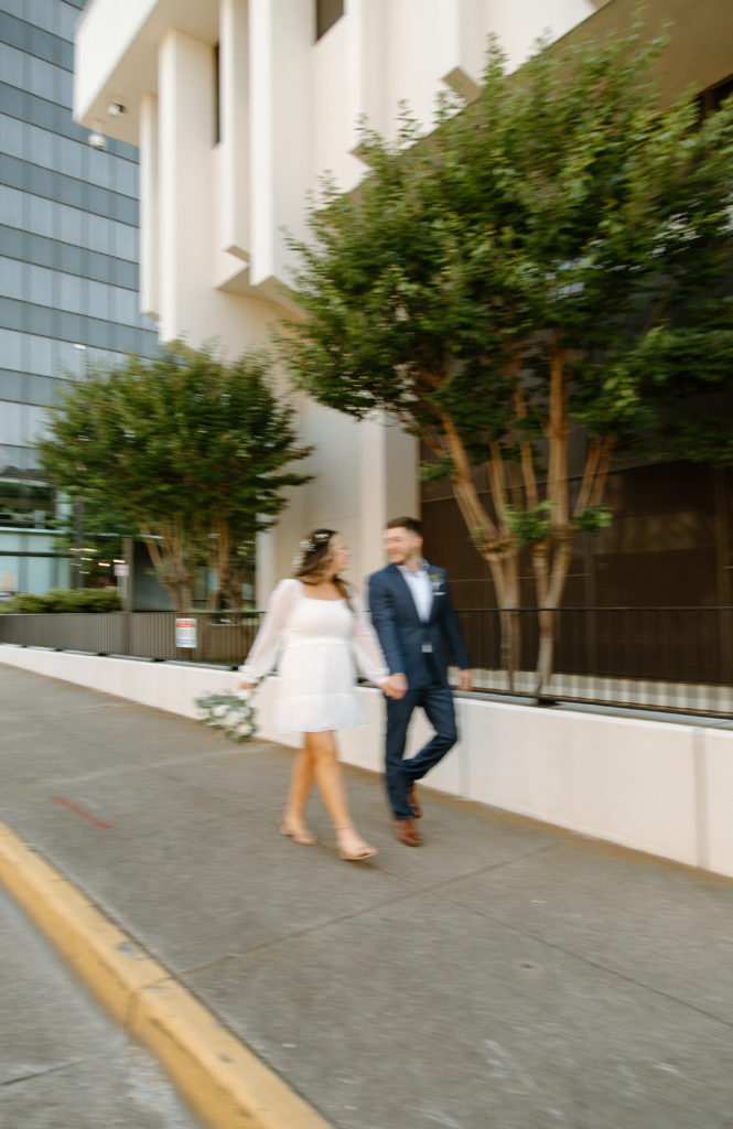 Bride and Groom's Portraits in Downtown Tyler, Texas for Intimate Wedding Day captured by Lizzie Hillard Photography.