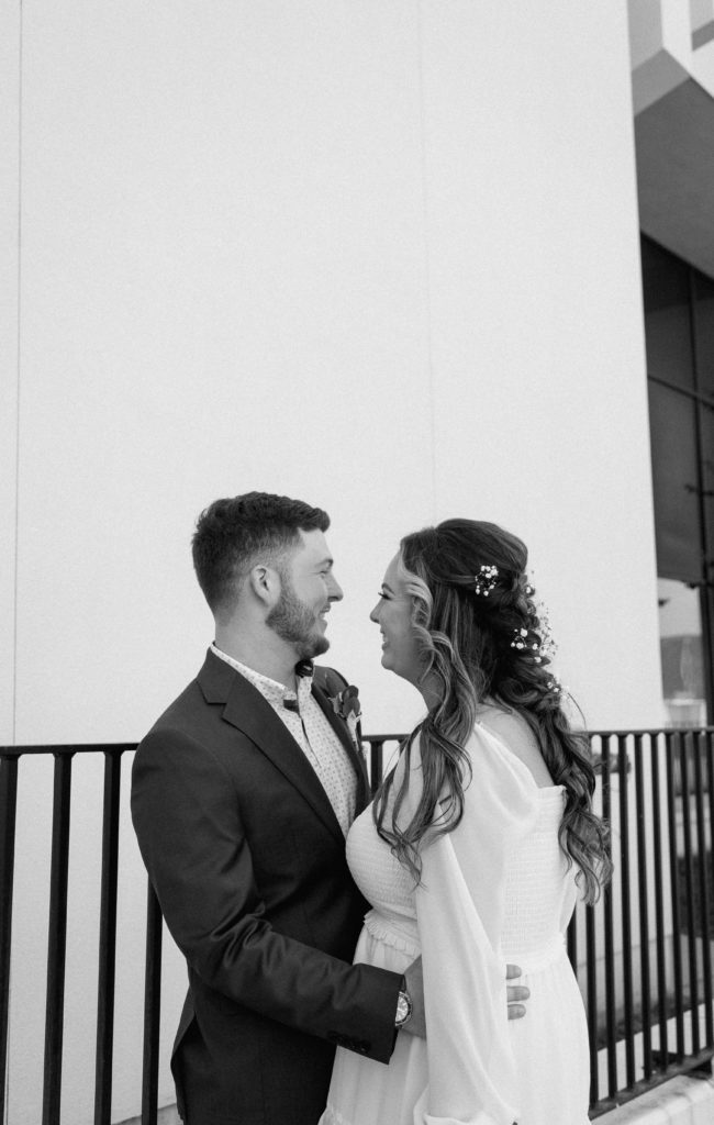 Bride and Groom's Portraits in Downtown Tyler, Texas for Intimate Wedding Day captured by Lizzie Hillard Photography.