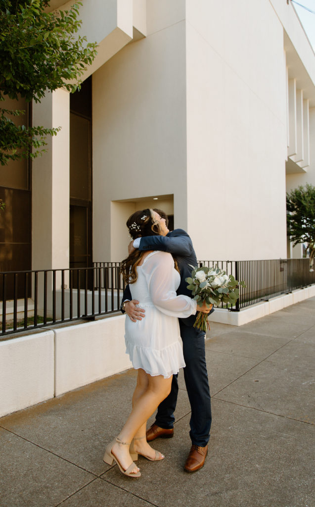 Bride and Groom's First Look in Downtown City. 