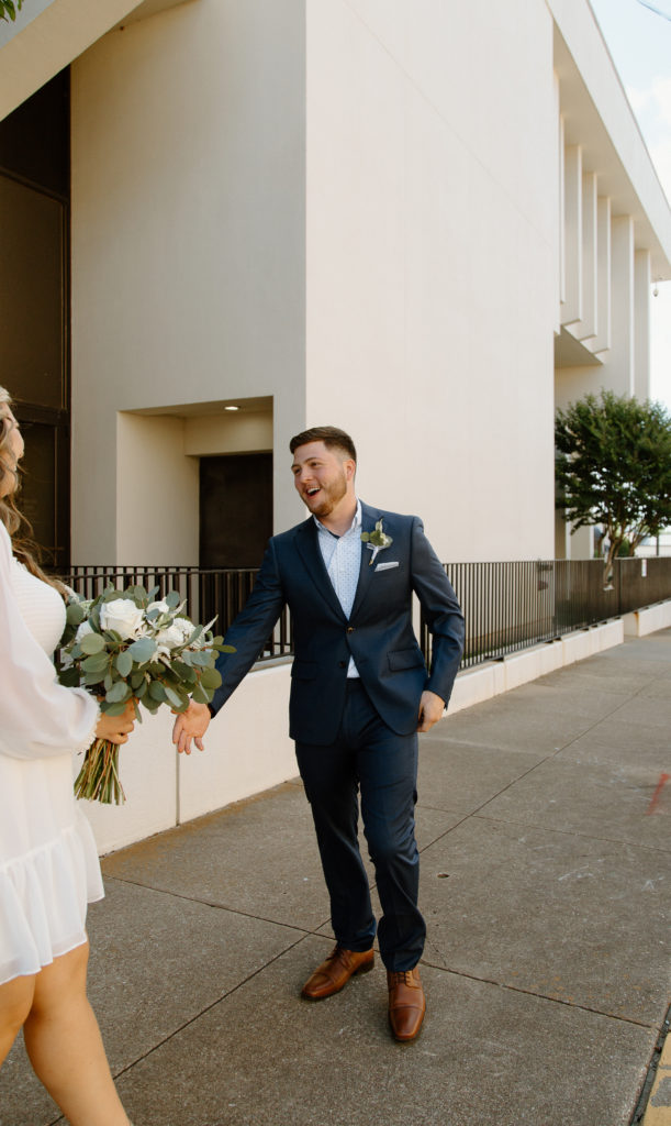 Bride and Groom's First Look in Downtown City. 