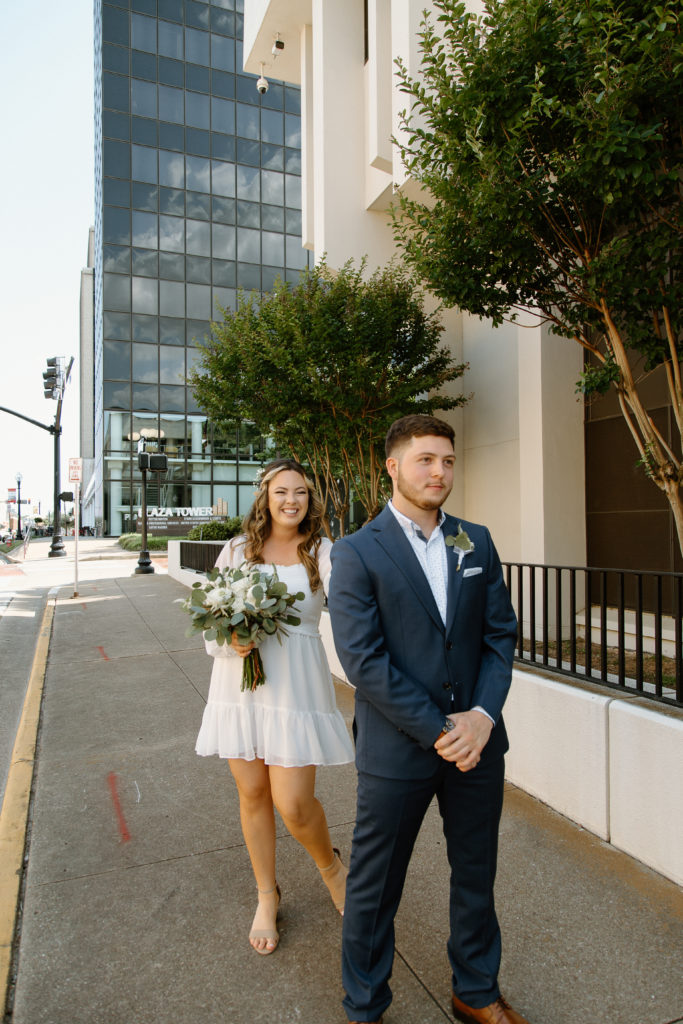 Bride and Groom's First Look in Downtown City. 