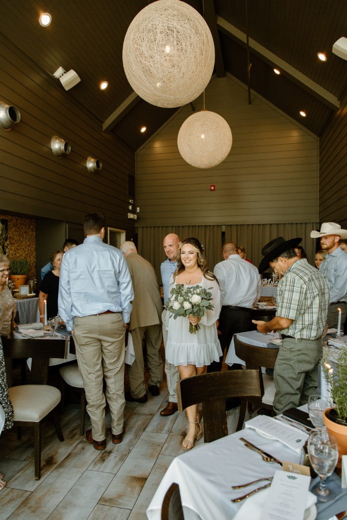 Intimate Wedding Ceremony in The Wine Room at The Grove Kitchens + Garden in Tyler, Texas captured by Lizzie Hillard Photography.