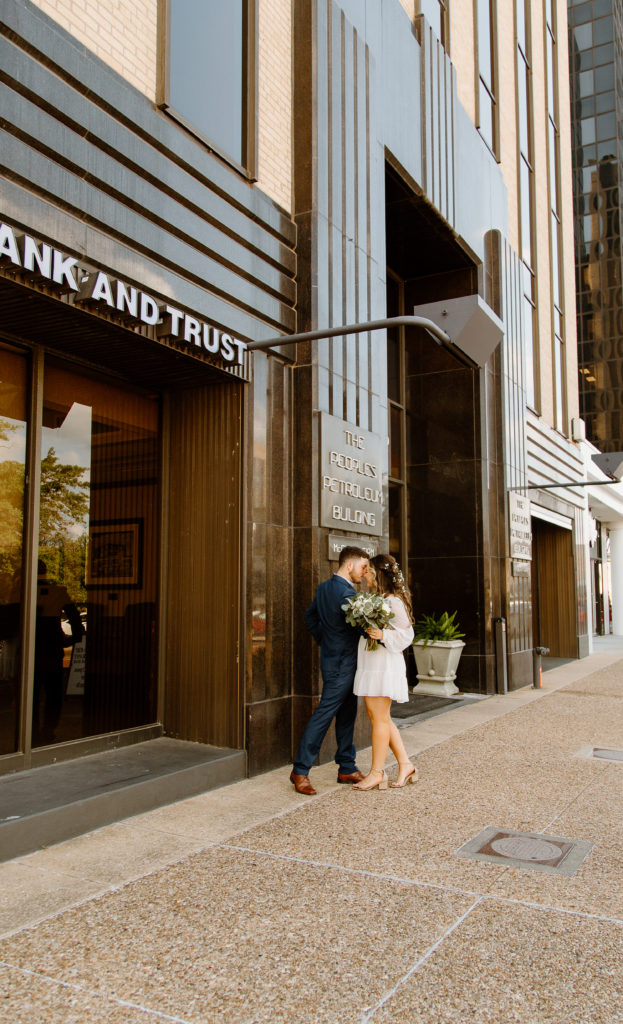 Bride and Groom's Portraits in Downtown Tyler, Texas for Intimate Wedding Day captured by Lizzie Hillard Photography.