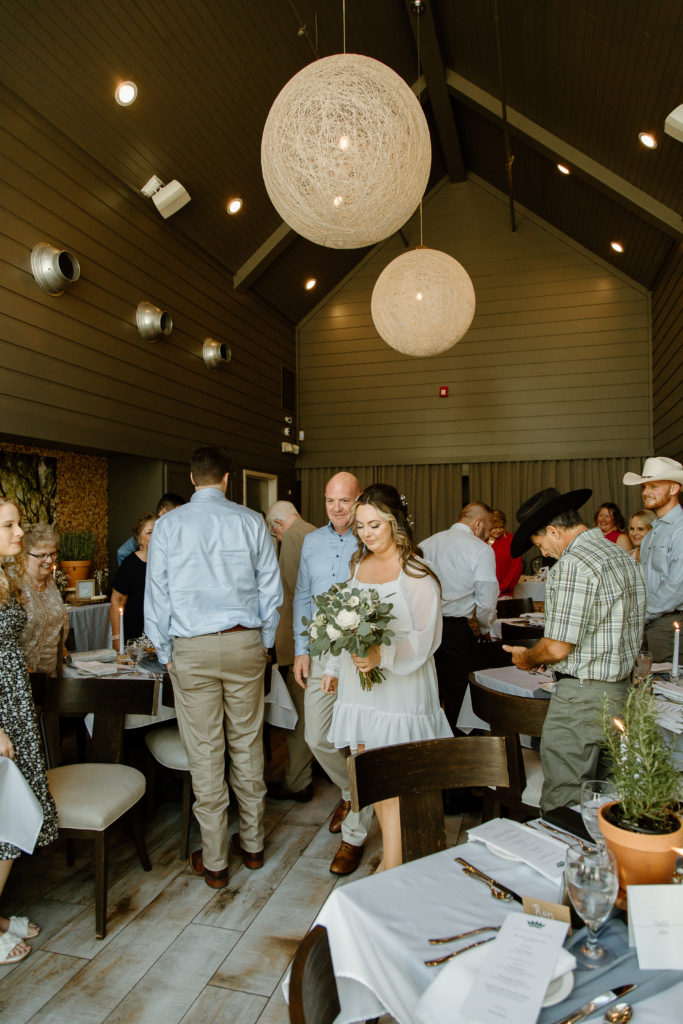 Intimate Wedding Ceremony in The Wine Room at The Grove Kitchens + Garden in Tyler, Texas captured by Lizzie Hillard Photography.