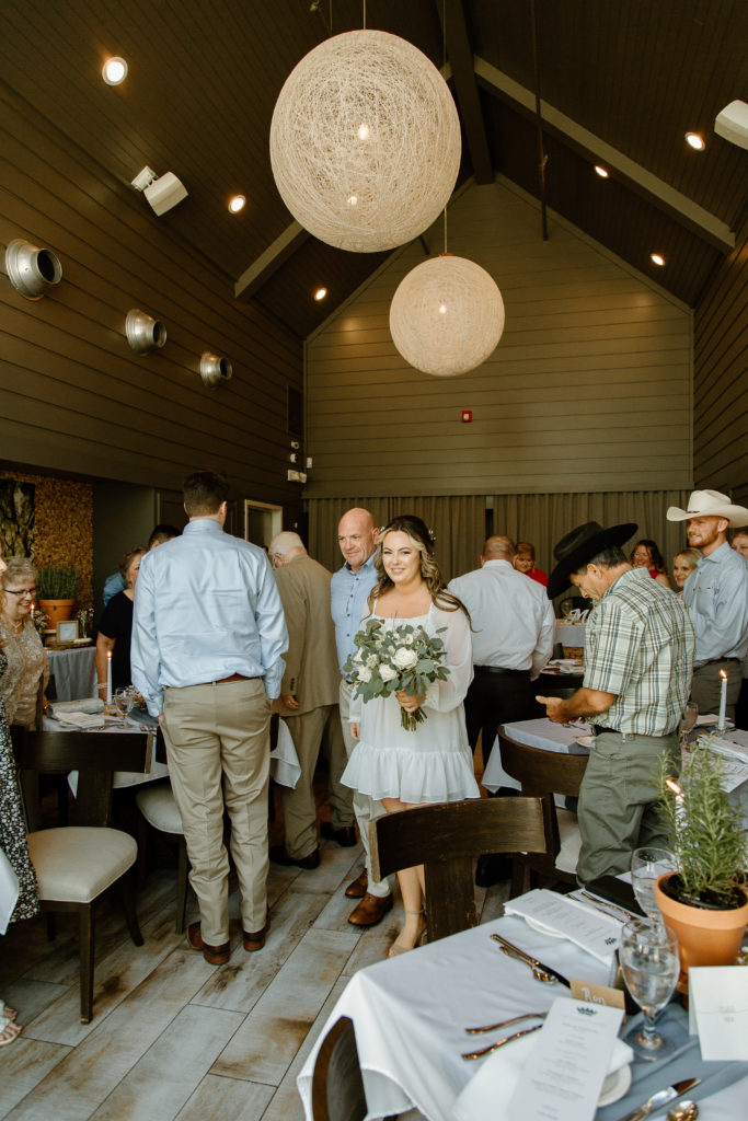 Intimate Wedding Ceremony in The Wine Room at The Grove Kitchens + Garden in Tyler, Texas captured by Lizzie Hillard Photography.