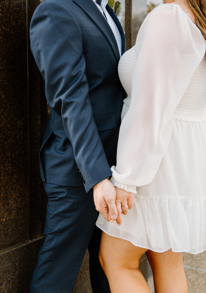 Bride and Groom's Portraits in Downtown Tyler, Texas for Intimate Wedding Day captured by Lizzie Hillard Photography.