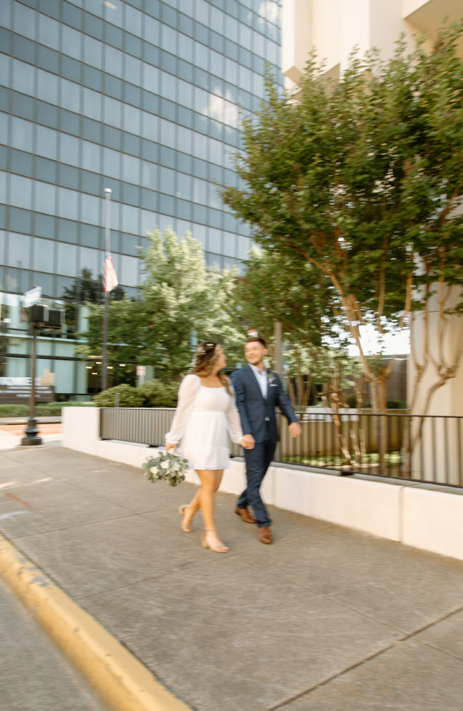 Bride and Groom's Portraits in Downtown Tyler, Texas for Intimate Wedding Day captured by Lizzie Hillard Photography.