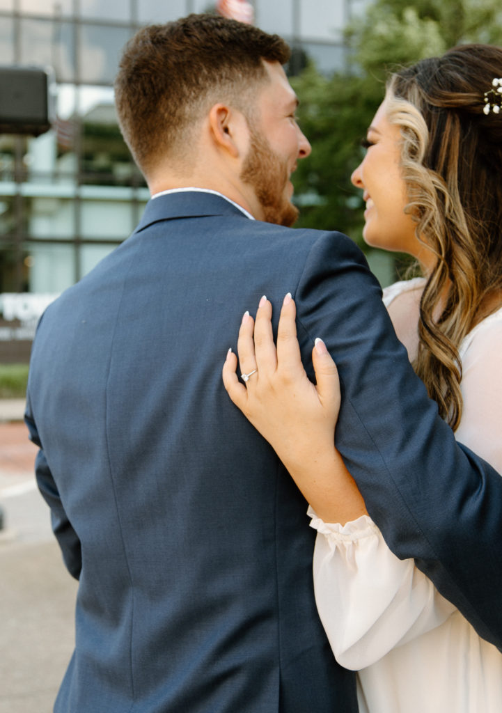 Bride and Groom's Portraits in Downtown Tyler, Texas for Intimate Wedding Day captured by Lizzie Hillard Photography.