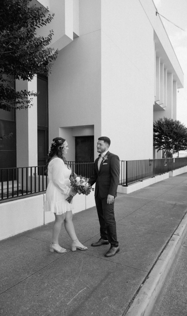 Bride and Groom's First Look in Downtown City. 