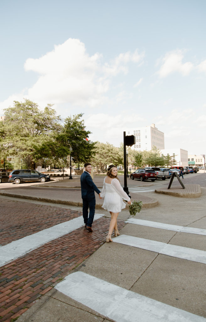 Bride and Groom's Portraits in Downtown Tyler, Texas for Intimate Wedding Day captured by Lizzie Hillard Photography.