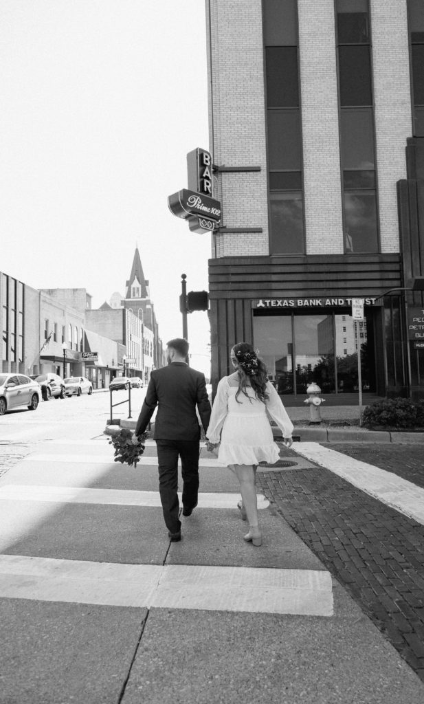 Bride and Groom's Portraits in Downtown Tyler, Texas for Intimate Wedding Day captured by Lizzie Hillard Photography.