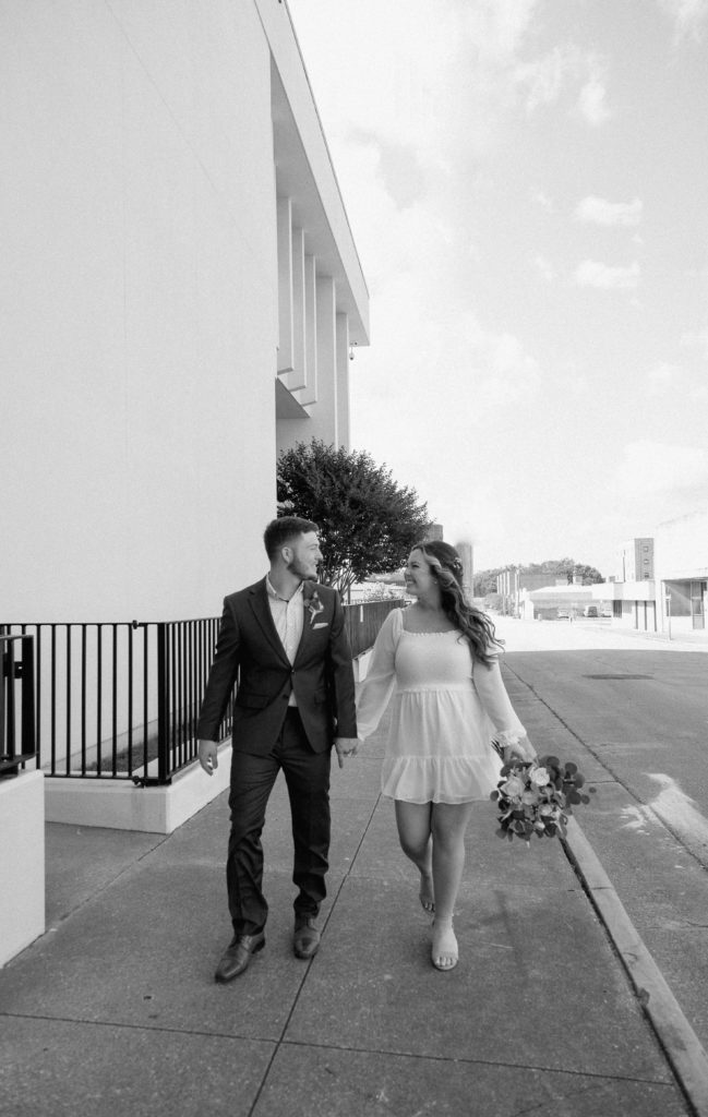 Bride and Groom's Portraits in Downtown Tyler, Texas for Intimate Wedding Day captured by Lizzie Hillard Photography.