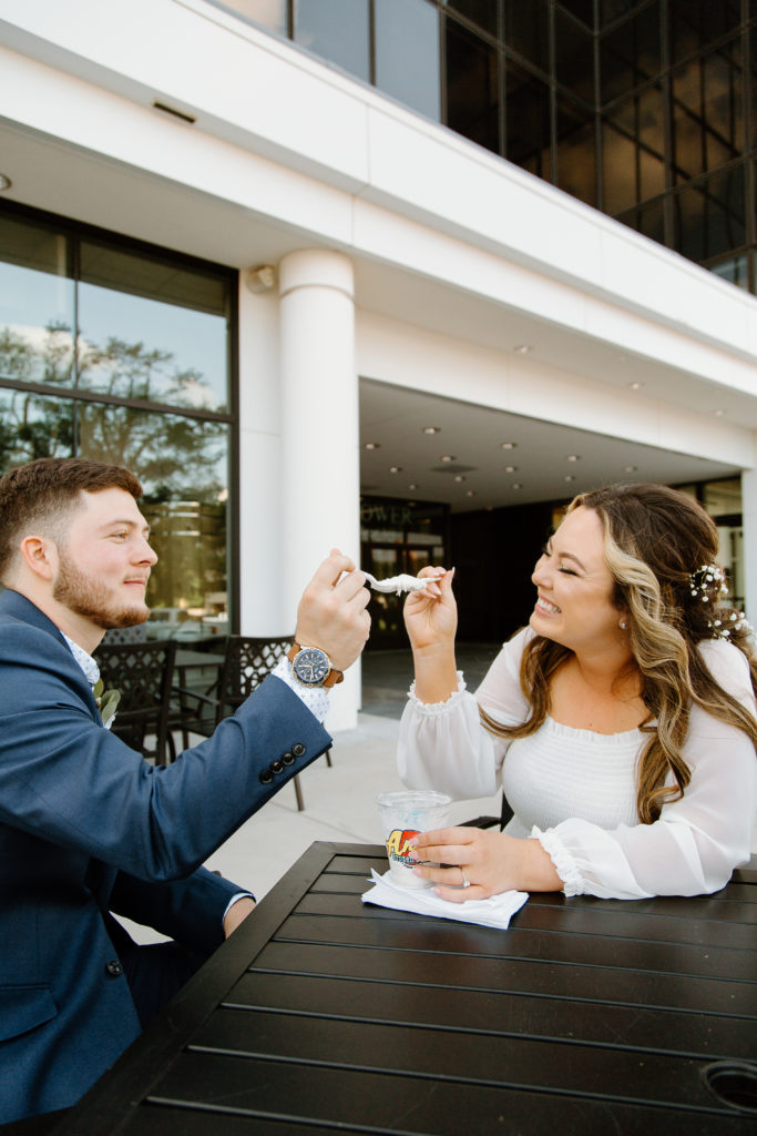 Bride and Groom's Portraits in Downtown Tyler, Texas for Intimate Wedding Day captured by Lizzie Hillard Photography. Ice cream at Andy's on the Tyler, Texas Square.