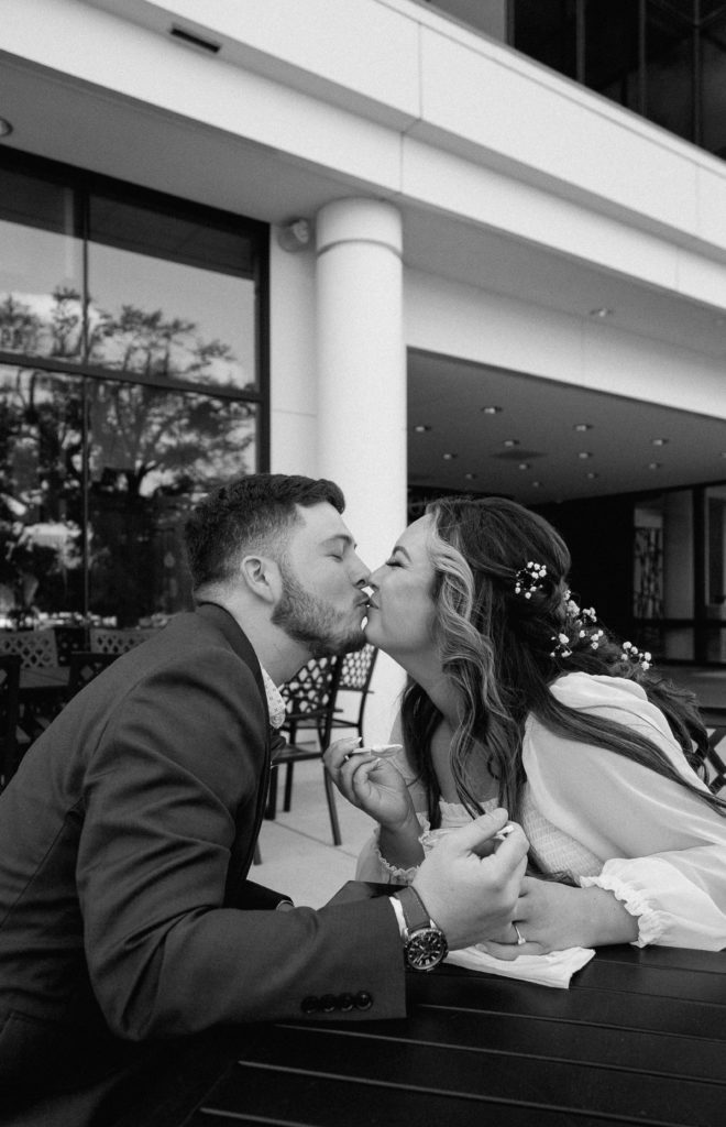 Bride and Groom's Portraits in Downtown Tyler, Texas for Intimate Wedding Day captured by Lizzie Hillard Photography. Ice cream at Andy's on the Tyler, Texas Square.