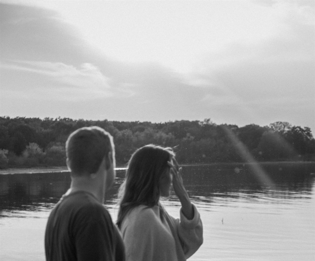 Couple looks at Lake Tawakoni State Park in black and white.