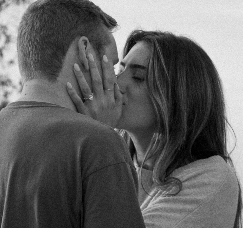 Close up of couple kissing during engagement photos.