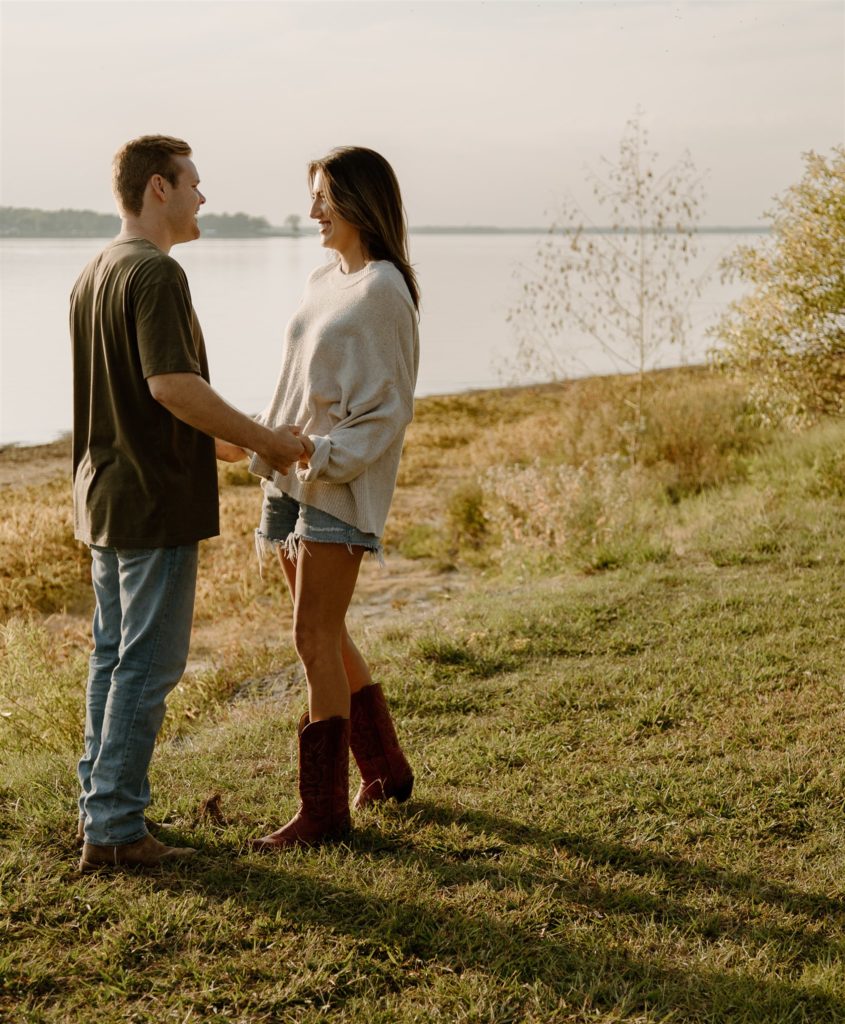 Couple holds hands during engagement photos at Lake Tawakoni State Park.