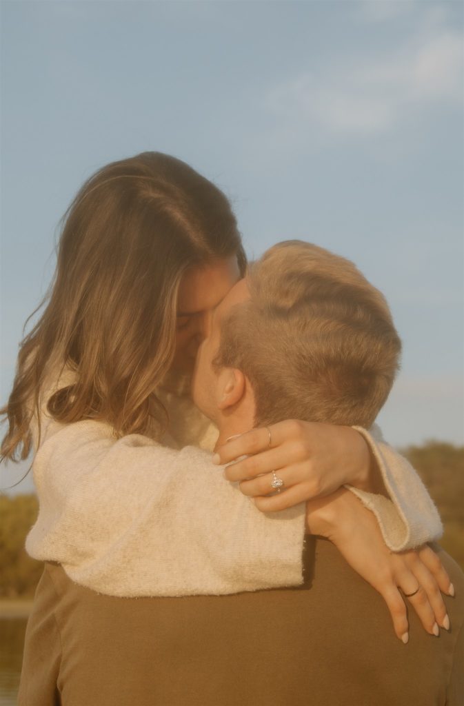 Close up of couple kissing at Lake Tawakoni State Park.