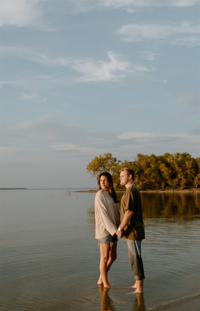 Couple staring at the sunset at Lake Tawakoni.