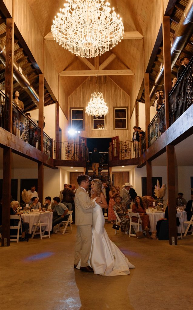 Bride and groom first dance at texas wedding reception.