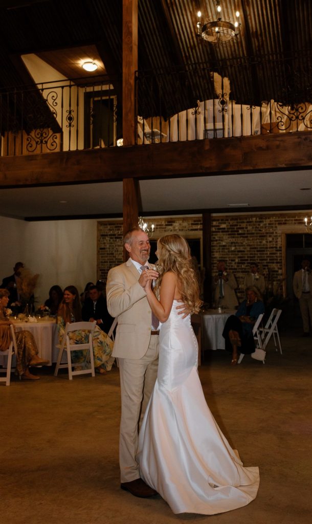 Father daughter dance at texas wedding reception.