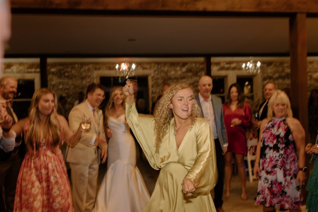 Girl dances at Texas wedding reception.