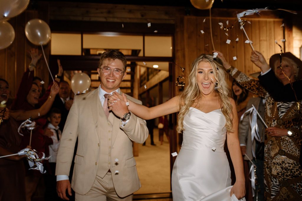 Bride and groom smiles during texas wedding exit.