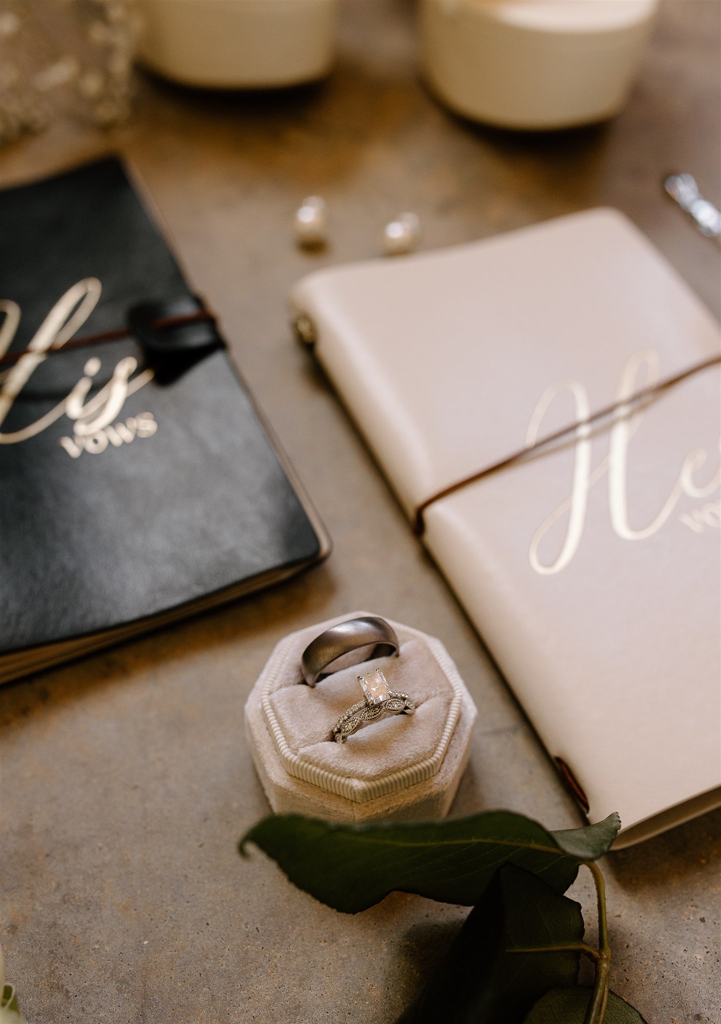 Elegant Flatlay Wedding Inspiration with wedding rings and vow books.