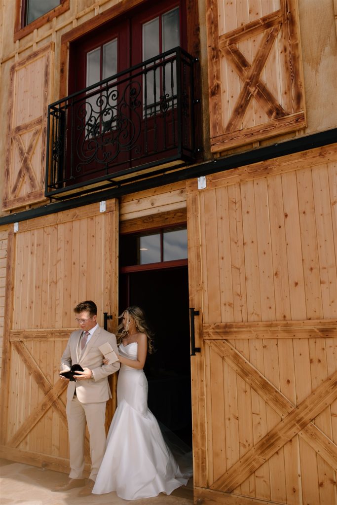 Bride anticipates groom's private vows during first touch.