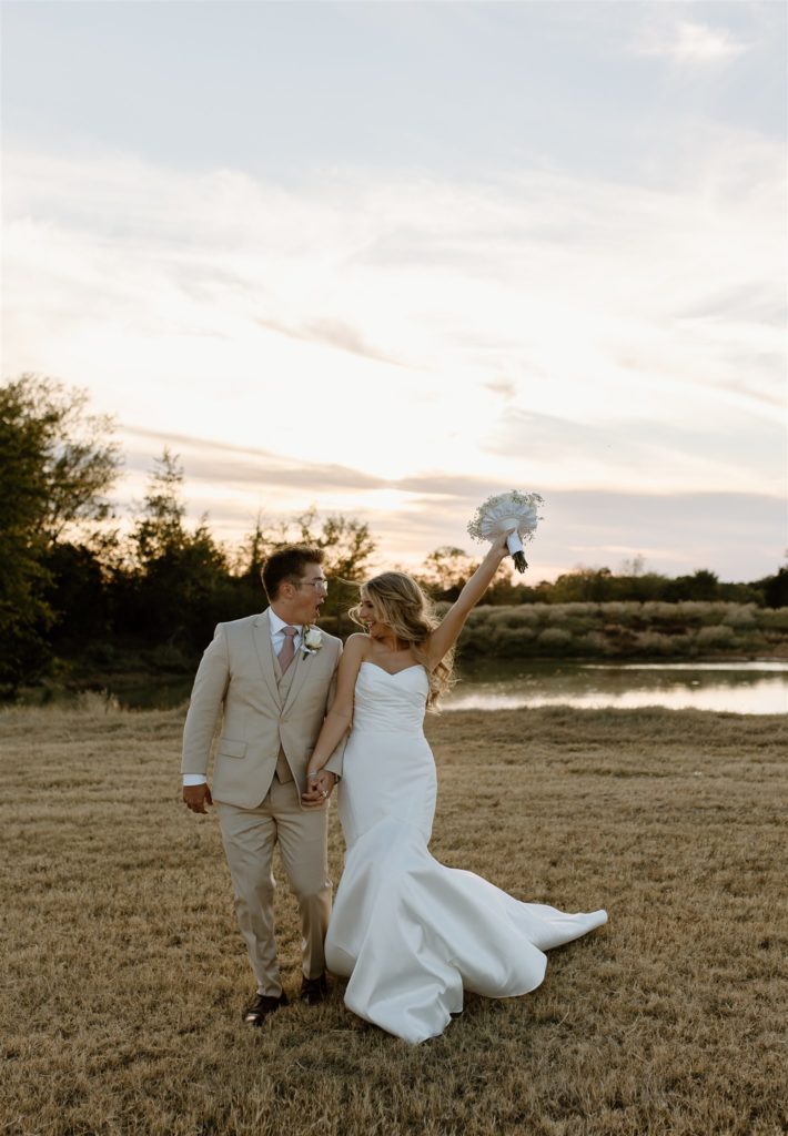 Bride and groom walk towards camera after texas wedding ceremony.