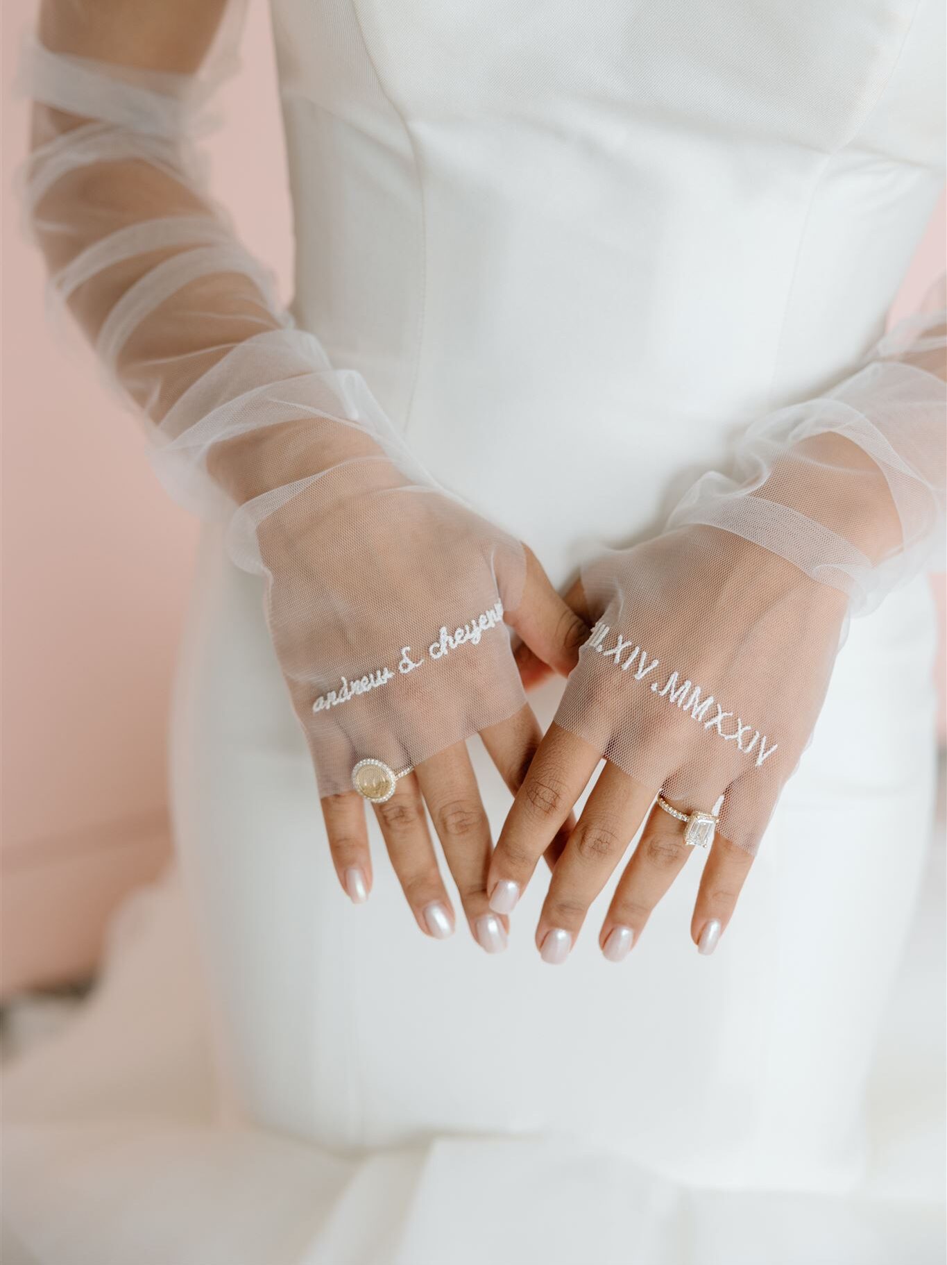 Dallas Bride poses for camera with custom bridal details at The Lumen Room.